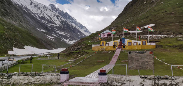 Zojila war memorial during a snowy day.  During the Indo-Pakistani War of 1947, Zoji La was seized by Pakistani supported invaders in 1948. Jammu and Kashmir, India - June 16 2019: Zojila war memorial during a snowy day.  During the Indo-Pakistani War of 1947, Zoji La was seized by Pakistani supported invaders in 1948. tiger hill stock pictures, royalty-free photos & images