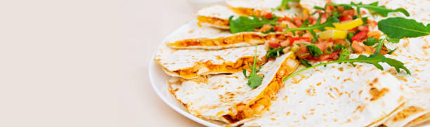 istock Delicious quesadilla with chicken, corn and salsa. Banner. 1167136237
