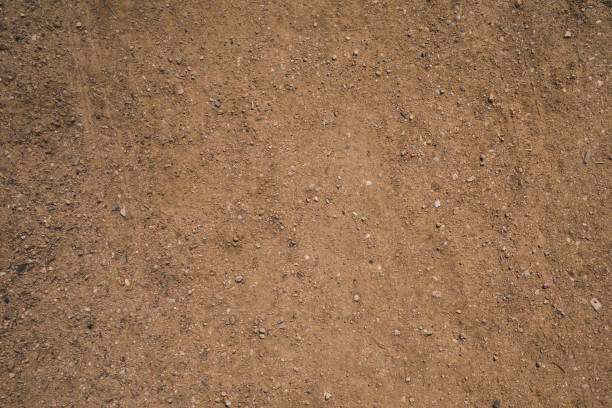 Dirt road surface texture stock photo