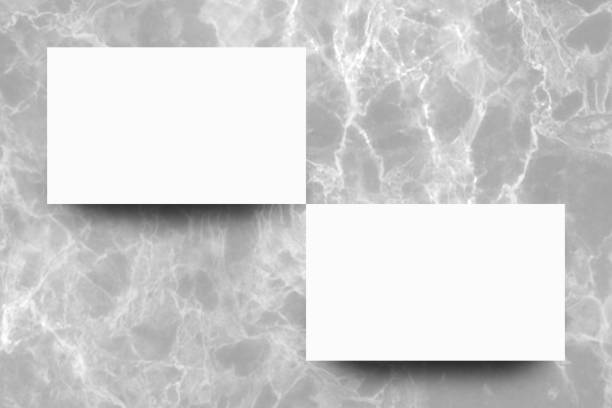 istock Empty white paper sheet on Grey marble background,Mock up for design. 1167139848