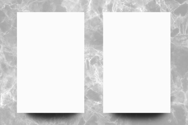 istock Empty white paper sheet on Grey marble background,Mock up for design. 1167139857