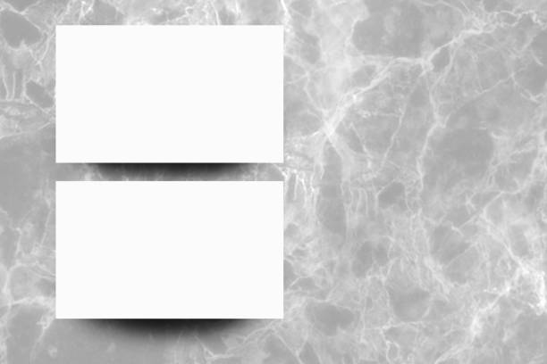 istock Empty white paper sheet on Grey marble background,Mock up for design. 1167139869