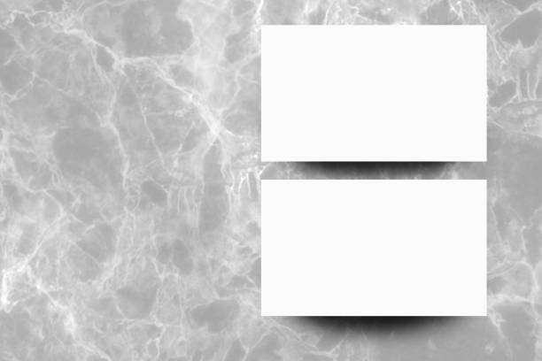 istock Empty white paper sheet on Grey marble background,Mock up for design. 1167139875