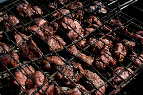 istock meat is fried on the grill over the coals 1167142972