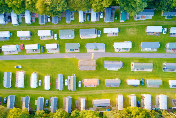 istock Caravan site park aerial view illuminated by summer sun 1167148699