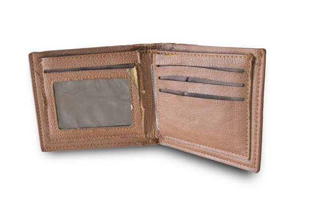 istock Old brown wallet isolated on white background. 1167151648