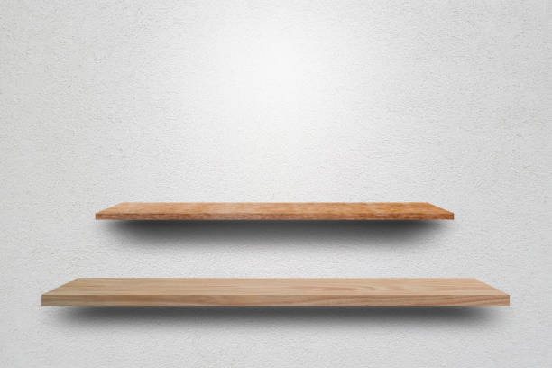 istock Front view empty wooden shelf and grey wall. Design concept 1167151714
