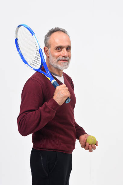 istock man playing tennis on white background 1167151919