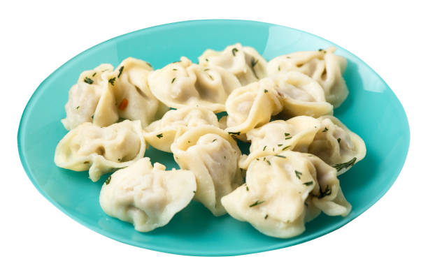 istock dumplings on a plate isolated on white background .meat dumplings top view . 1167152188