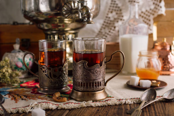 istock Samovar. Russian traditional tea party, tea in a cup holder, bagels 1167153330