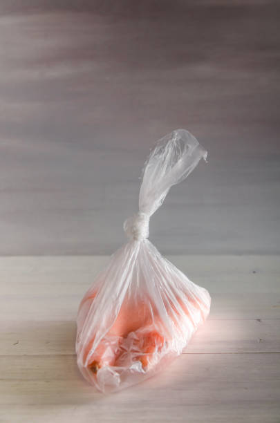 istock concept plasic free carrots in a plastic bag on a white background 1167154011