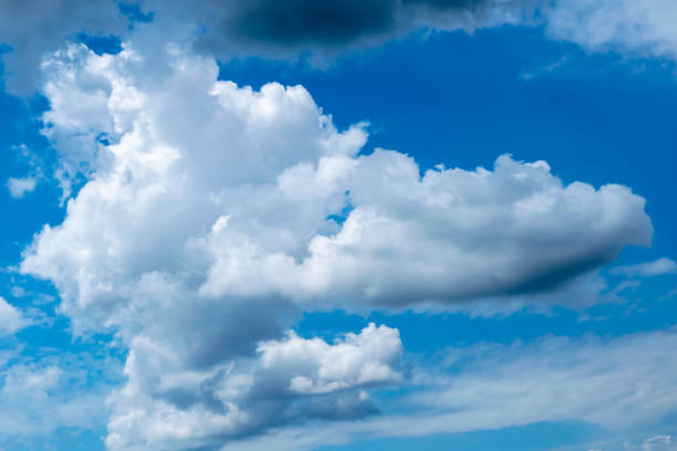 istock Cumulonimbus  clouds on a summer blue sky 1167154554