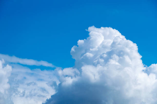 istock Cumulonimbus  clouds on a summer blue sky 1167154556
