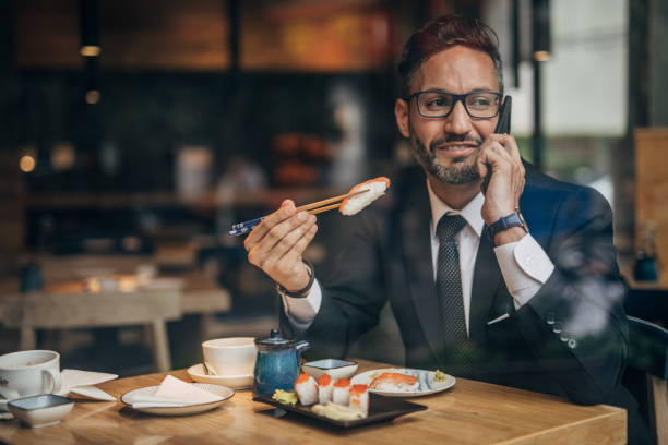 istock Gentleman on lunch in sushi bar 1167156617