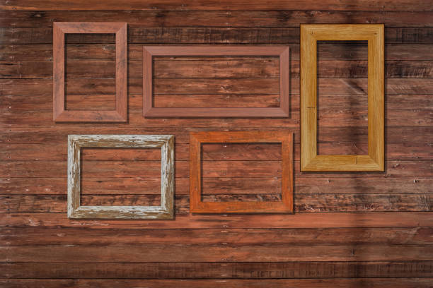istock Vintage photo frames on wood wall for interior or background. 1167157958