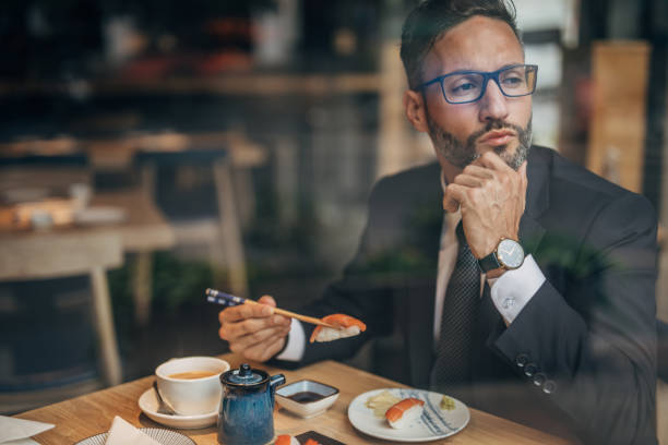 istock Handsome businessman on lunch break 1167158937