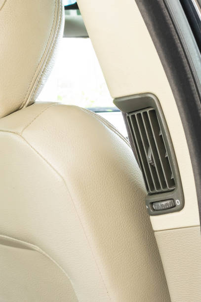 istock 2000's luxury black car back seats air ventilations 1167158987