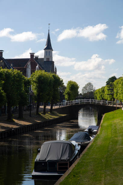 istock Canal in historic Dutch town locks 1167159233