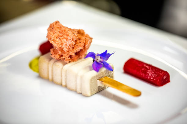 Molecular cuisine dish created to look like ice cream dessert, ready to eat
