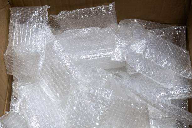 istock used bubble plastic bag in paper box for recycling. 1167168972
