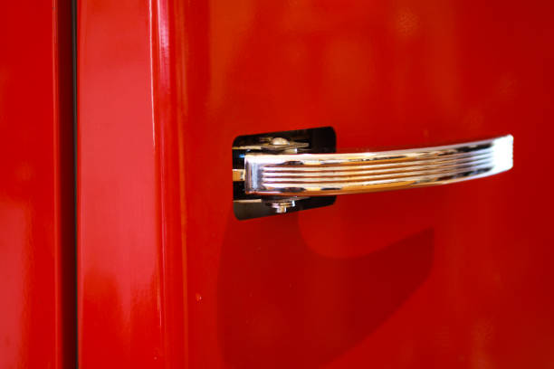 istock Isolated Chrome handle of red fridge 1167174201