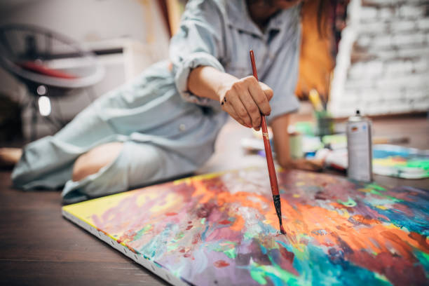 istock Artist painting on the floor 1167175344