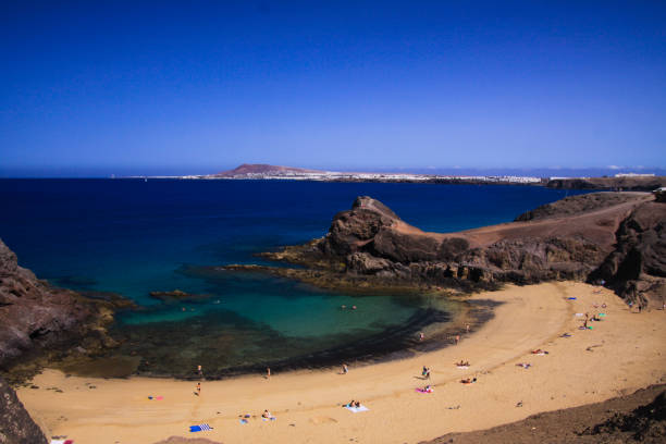 istock View from steep cliff into blue lagoon beach 1167177046