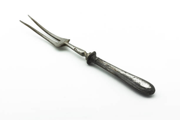 istock Antique vintage meat fork on white background 1167178938