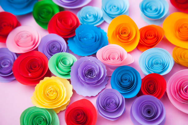 istock Paper flowers placed on pink background 1167179188