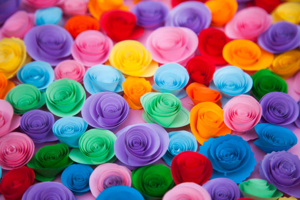 istock Paper flowers placed on pink background 1167179862
