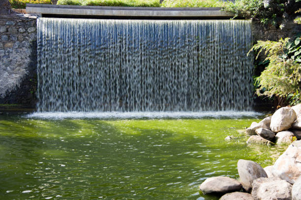 Beautiful view on cascading waterfall in Public Doramas Park in Las Palmas, Gran Canary, Spain