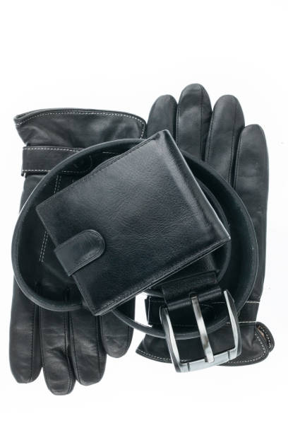 istock Men accessories. Mens wallet, belt and gloves on white background. 1167184488