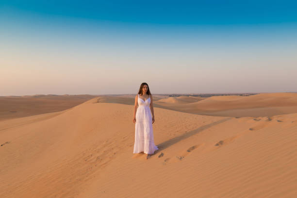 istock UAE. Woman in desert 1167186035