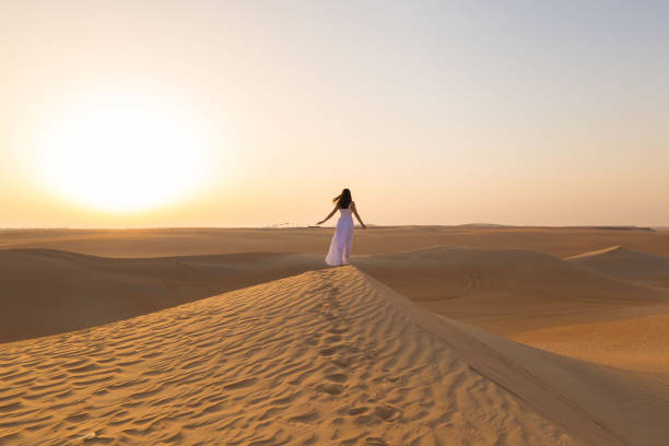 istock UAE. Woman in desert 1167186048