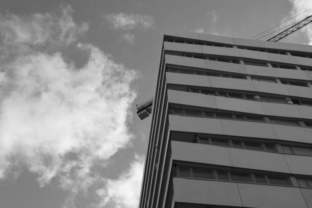 istock Building under construction under the watchful eye of the crane 1167186084
