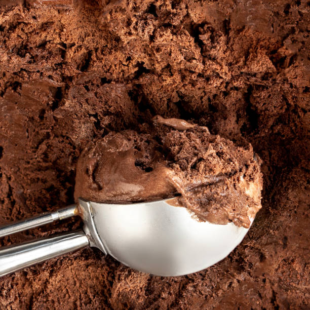 istock Chocolate  ice cream scoop.  Dark cocoa Ice-cream Background or Texture. Top view
