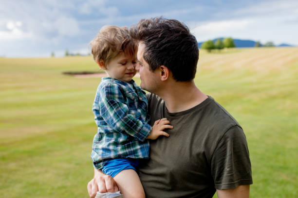 istock Father and toddler boy have a fun in a mountains 1167189314