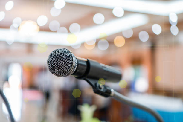 istock Microphone abstract prepare for speaker speech of conference or seminar hall at exhibition room background. Business Talk Presentation concept 1167189548