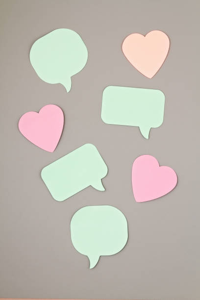 istock Mockup with sticker notes in forms of speech bubbles and hearts with copy space 1167189661