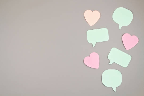 istock Mockup with sticker notes in forms of speech bubbles and hearts with copy space 1167189666