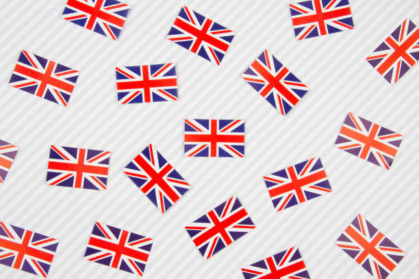 istock Paper striped background with United Kingdom flags 1167189725