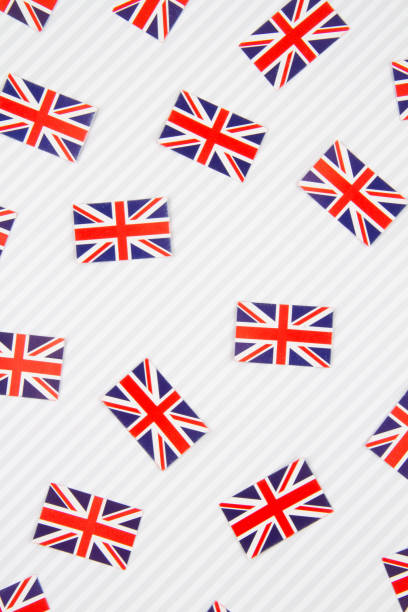 istock Paper striped background with United Kingdom flags 1167189737