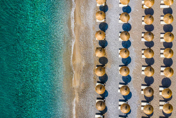 istock Beach coastline dotted with umbrellas 1167191991