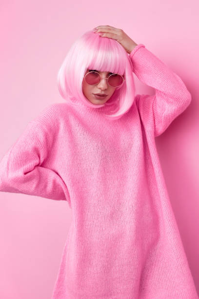 istock Young lover of pink color posing for camera 1167195249