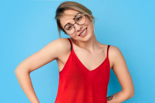 istock Friendly young woman in glasses 1167195365