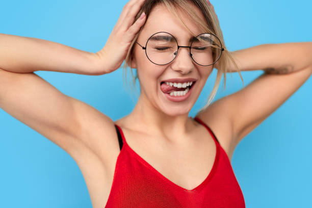 istock Crazy young woman with closed eyes 1167195370