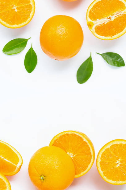 istock Orange with green leaves isolated on white background. 1167196147