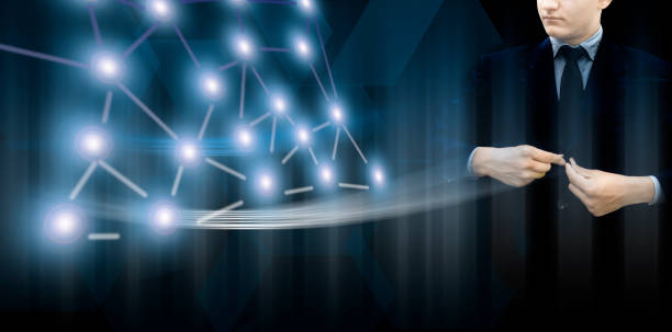 istock Entrepreneur/Businessman/technologist wearing a blue colored blazer and standing against a blue-colored digital virtual imaginative background and showing strength & peace through folded hands. 1167199804
