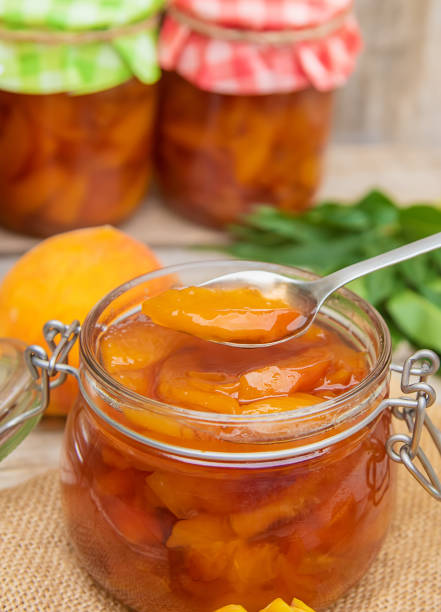 istock Preservation of peach jam. Selective focus. food. 1167204056