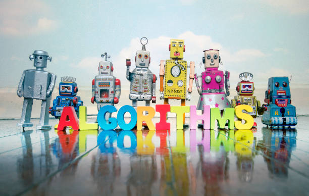 istock ALGORITHMS  wooden letters and retro robot toys 1167206128